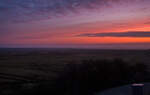 Morgenstimmung auf Wangerooge am 13 März 2024 (um ca. 6:30 Uhr), Blick von unserem Balkon vom Hotel „Westerooge“ im Westen der Insel. Rechts in der Ferne der Ort Wangerooge.